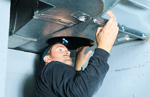Meenan tech checking ductwork