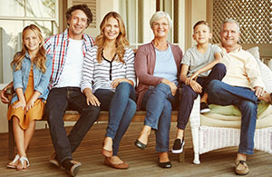 Family sitting on porch