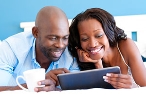 Couple looking at iPad